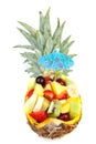 Pineapple filled with fresh summer fruits Royalty Free Stock Photo