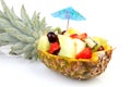 Pineapple filled with fresh summer fruits Royalty Free Stock Photo