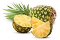 Pineapple fruit whole and cut in half and slice with green leaves Royalty Free Stock Photo