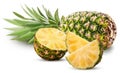 Pineapple fruit whole and cut in half and slice with green leaves Royalty Free Stock Photo