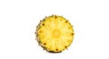A pineapple half is positioned on a white background, showcasing its vibrant yellow interior. Royalty Free Stock Photo