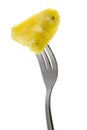 Pineapple held by a fork Royalty Free Stock Photo