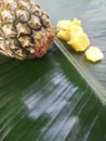 Pineapple and its slices placed in a green banana leaf. Royalty Free Stock Photo