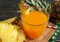 Pineapple juice on wooden background cocktail beverage healthy Royalty Free Stock Photo