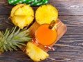 Pineapple juice on wooden background cocktail beverage Royalty Free Stock Photo