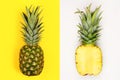 Pineapple layout with whole fruit on yellow and half slice on white Royalty Free Stock Photo