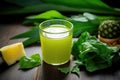 pineapple leaf top beside juice-filled glass