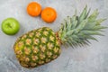 Pineapple, mandarines and apple Royalty Free Stock Photo