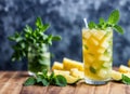 Pineapple mint agua fresca in a glass with a background of fresh pineapple chunks and mint leaves. AI generated.