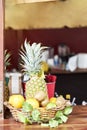 Pineapple, oranges, kiwis and lemons on the bar for cocktails. Drink concept Royalty Free Stock Photo