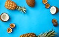 Pineapple, passion fruit and coconut on blue Royalty Free Stock Photo