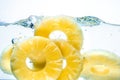Pineapple. Preserved fruit splash in water
