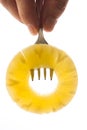 Pineapple ring on a fork Royalty Free Stock Photo