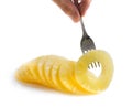 Pineapple ring on a fork Royalty Free Stock Photo