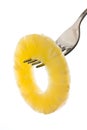 Pineapple ring on a fork Royalty Free Stock Photo