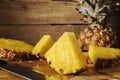 Board with delicious cut pineapple table Royalty Free Stock Photo