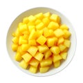 pineapple slices in a bowl on a white background. top view