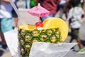 Pineapple smoothies served in a genuine pineapple jar.