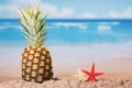 Pineapple stands on sand, next to starfish, amid seascape