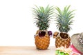 pineapple with sunglasses on wood,concept summer background. Royalty Free Stock Photo