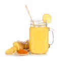 Pineapple, turmeric, ginger smoothie in a mason jar with ingredients isolated on a white background. Royalty Free Stock Photo