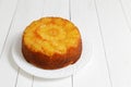 Pineapple Upside Down Cake on white wooden table Royalty Free Stock Photo