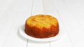 Pineapple Upside Down Cake on white wooden table Royalty Free Stock Photo