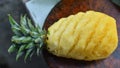 Pineapple on wooden block Royalty Free Stock Photo