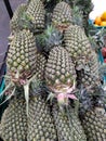 Pineapples in a fruit shop in market in india Royalty Free Stock Photo