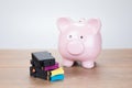 Ping piggy bank with empty printer ink cartridges Royalty Free Stock Photo