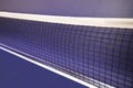 Ping pong net in a blue table Royalty Free Stock Photo