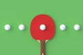 Ping pong paddle with balls on green background. Game for leisure. Sport equipment Royalty Free Stock Photo