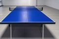 Ping pong table with net close-up. Blue ping pong table close-up Royalty Free Stock Photo