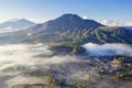 Pinggan village with Batur mount at misty morning