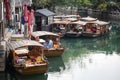 Figures in boats Pingjiang Road, Gusu District, Suzhou, China with canal