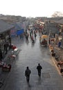 Pingyao in Shanxi Province China: View overlooking a street with traditional buildings and street vendors in Pingyao old town