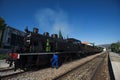 Pinhao, portugal - july 15, 2017:a mechanich fixes an ancient steam train