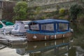 View of a jet boats and recreational tourism boat on the Pinhao city marina with Douro river on background