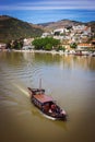 Pinhao village in Portugal. Douro valley and river with boat Royalty Free Stock Photo