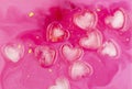 Pink abstract background of ice hearts. Love concept, modern style. Romantic card with frozen heart Royalty Free Stock Photo