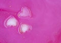 Pink abstract background of ice hearts. Love concept, modern style. Romantic card with frozen heart Royalty Free Stock Photo