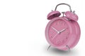 Pink alarm clock with the hands at 10 and 2 am or pm isolated on a white background