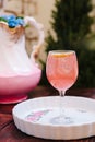 Pink alcoholic coktail in a tall wine glass Royalty Free Stock Photo