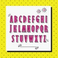 Pink alphabet capital letters set on yellow dotted pattern