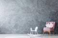 Pink armchair in kid`s room