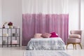 Pink armchair in girl`s bedroom Royalty Free Stock Photo