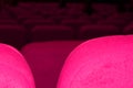 pink armchairs. Empty concert hall, theater chairs background ... color photo, empty cinema or concert hall. The red Royalty Free Stock Photo