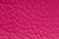 Pink artificial or synthetic leather background with neat texture and copy space Royalty Free Stock Photo