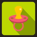 Pink baby pacifier icon, flat style Royalty Free Stock Photo