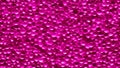 pink background with bubbles water drops pattern, showing the variation and the randomness of water. The drops are different